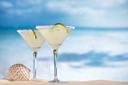 margarita  cocktail on beach, blue sea and sky