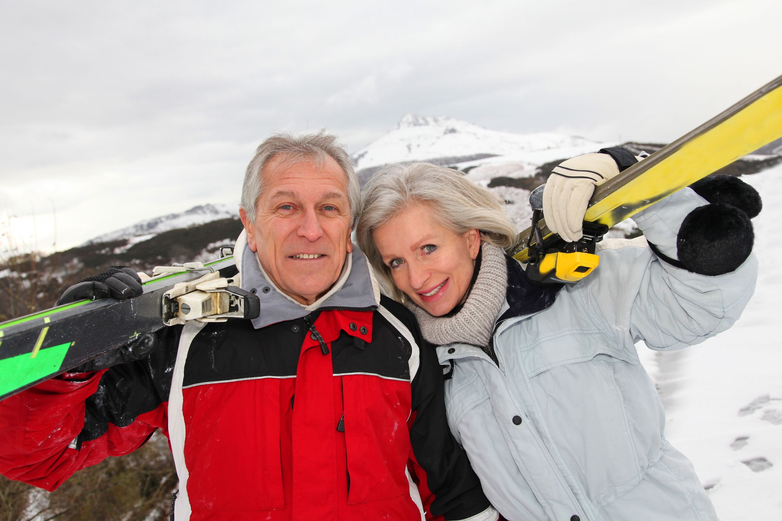 senior couple at ski resort