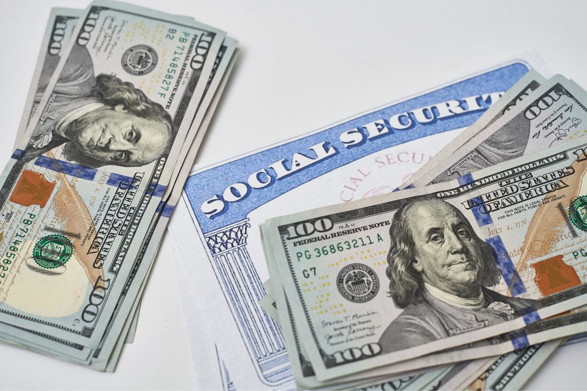 US Dollar Bills and social security card