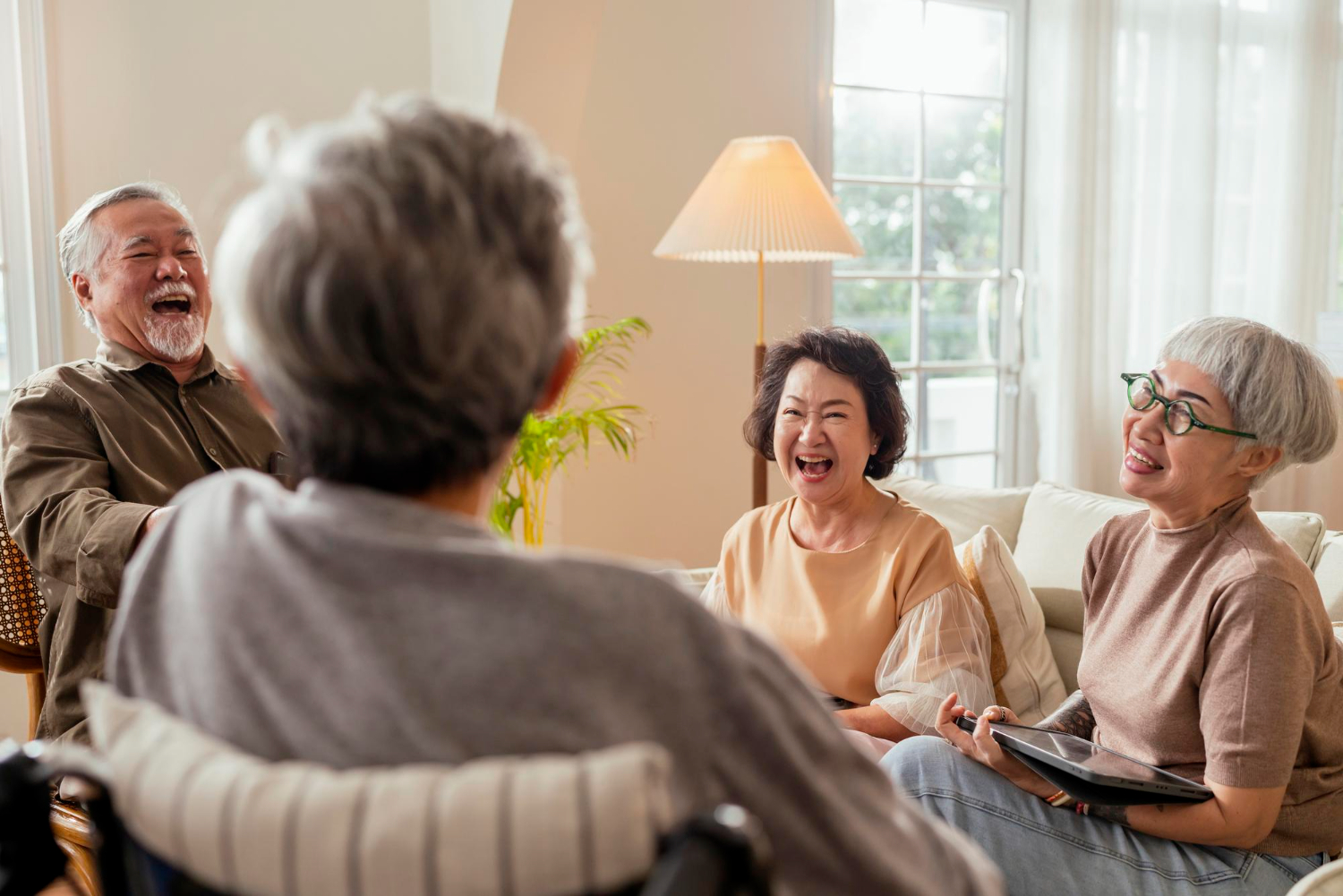 Group of Asian seniors smiling and laughing