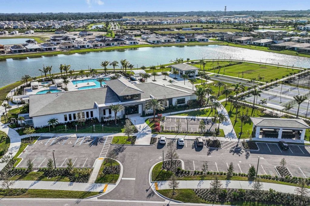 Aerial view ofCresswind at Palm Beach Amenity center with lake and house in the background