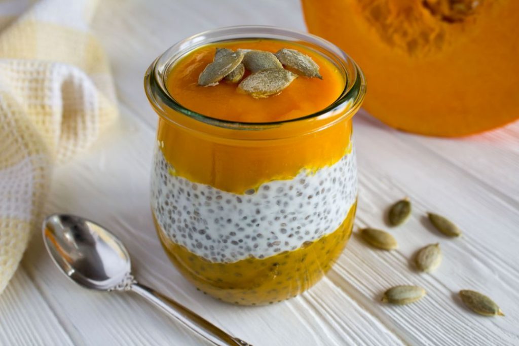 Chia pudding garnished with pumpkin seeds and chia seeds, highlighting a wholesome and visually appealing dish.