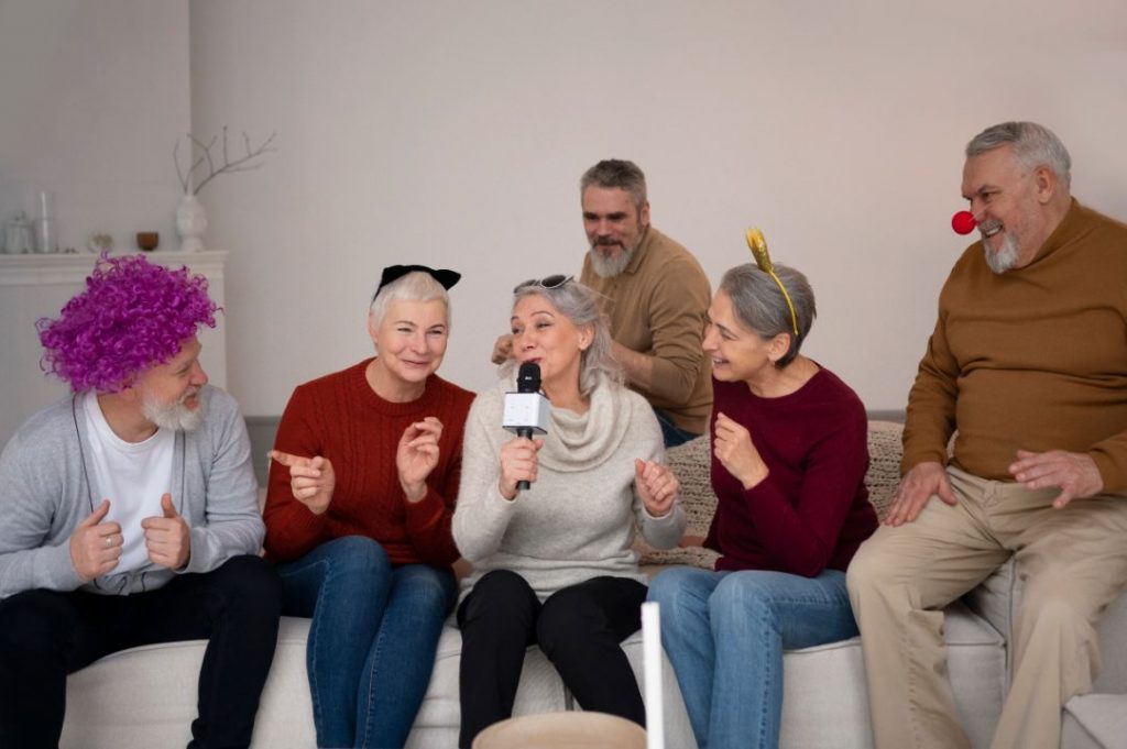 Friends gather on a couch, sharing stories and laughter, creating a warm atmosphere after dinner.