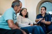 A coyple of seniors having an home visit form a Doctor